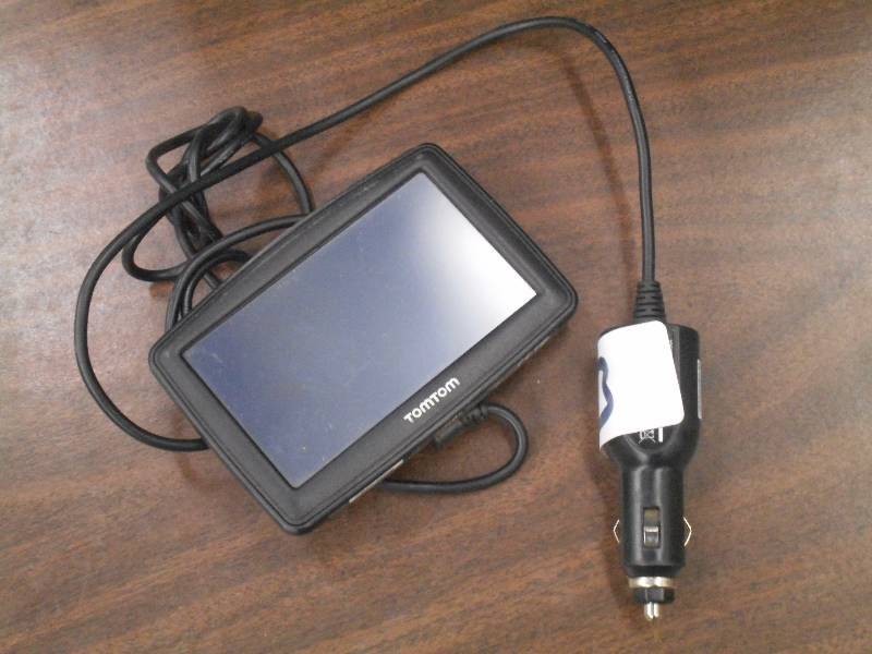 lot 53 image: TomTom GPS, 12Volt Plug ...