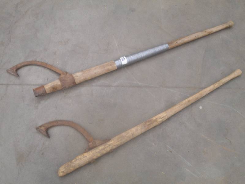 lot 76 image: (2) Vintage Log Rollers ...