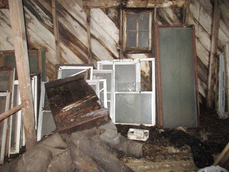 Vintage storm windows and screens