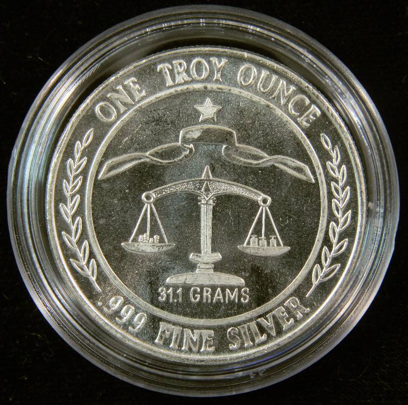 1 TROY OZ. .999 FINE SILVER MORGAN DOLLAR DESIGN IN AIRTITE HOLDER