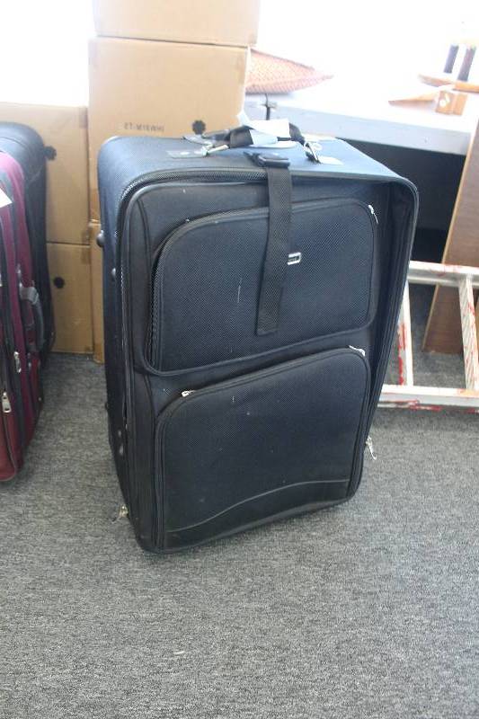 lot 208 image: Protege Luggage