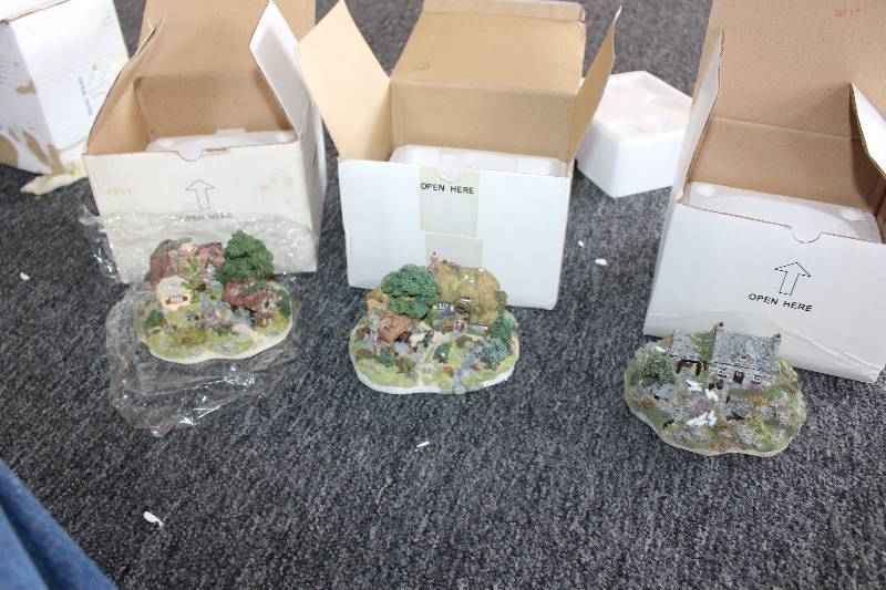 lot 191 image: Lot of (3) The Danbury Mint Table Decorations by Jane Hart From The Country Village Collection Including 1) Sheppards Cottage AND 1) The Village Smithy AND 1) The Dairy Farm