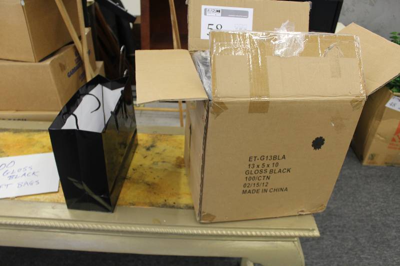 lot 58 image: Box Lot of Gloss Black Gift Bags