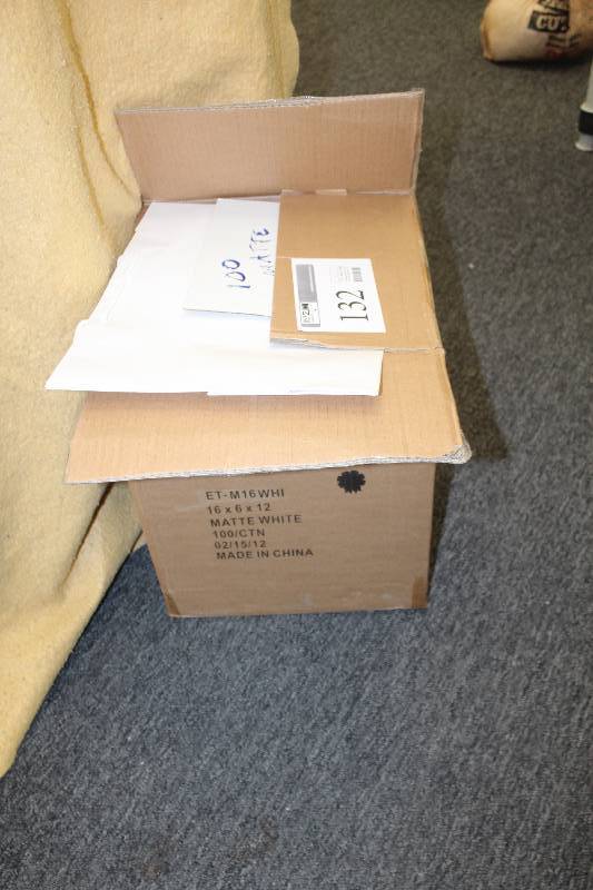lot 132 image: Box Lot of Matte White Gift Bags