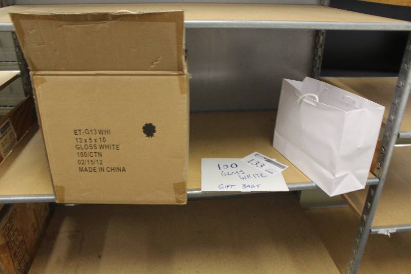 lot 133 image: Box Lot of Gloss White Gift Bags