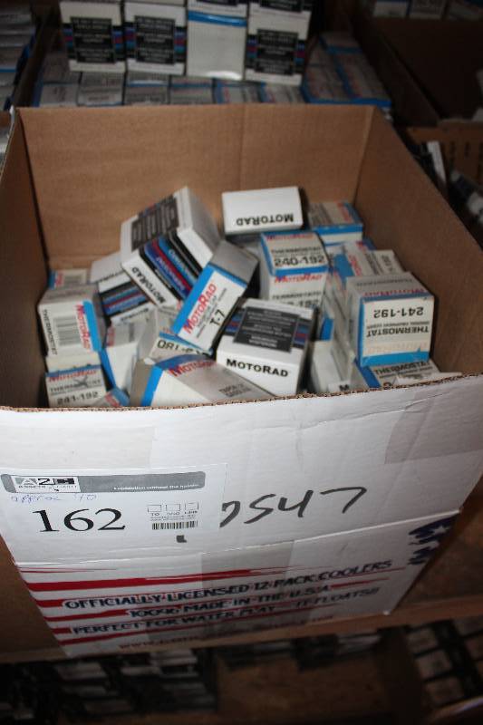 lot 162 image: Lot of (Approximately 40) MotoRad Thermostat, Gas Cap New In Box Includes T-7, 240-192, 240-180, 241-192