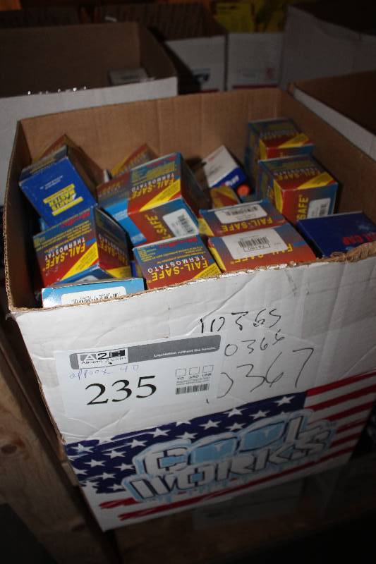 lot 235 image: Lot of (Approximately 40) MotoRad Thermostat & Oil Cap New In Box Includes P7340-195, P8061
