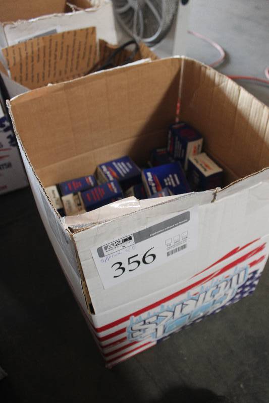 lot 356 image: Lot of (Approximately 40) Parts Plus Fuel Cap, Oil Cap, Radiator Cap New In Box Includes P8111, P7103, P7036, P7513
