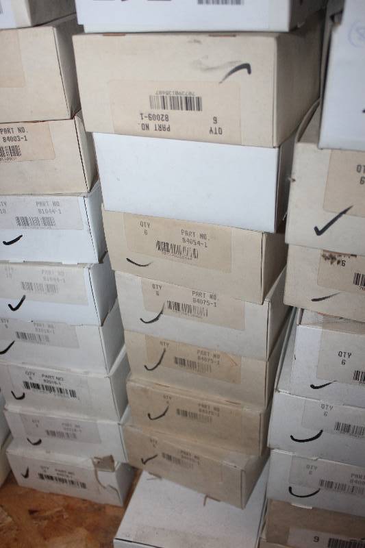 lot 292 image: Lot of (9) Automotive Parts 6-Count New In Box Includes 82009-1, 82054-1, 84075-1