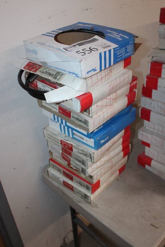 lot 556 image: Lot of (13) Raybestos, Brake-Pro Parking Brake Cable Assembly New In Box Includes 3092, 3478, 2943, 3083, 3093, 3060, 3267, 3596, 3213, 3576, 3512, 3739