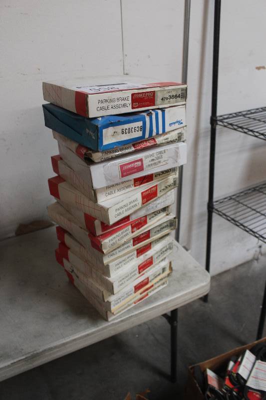 lot 558 image: Lot of (15) Raybestos, Brake-Pro Parking Brake Cable Assembly New In Box Includes 3039, 3063, 3062, 3093, 3043, 2995, 3348, 3216, 2946, 3093