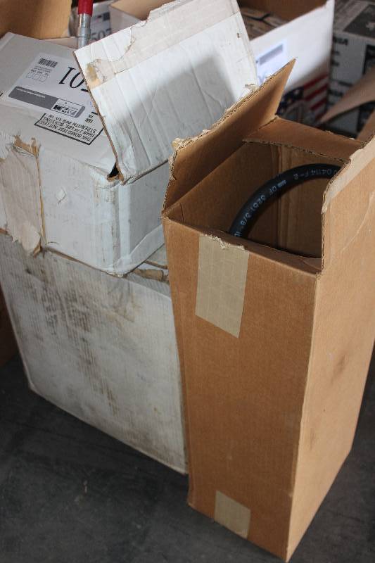 lot 501 image: Lot of (3) Automotive Parts New In Box Includes 1) Factory Air Accumulator #33202 AND 1) Omega Power Steering Hose #243 AND 1) Raybestos PG Plus Drum Brake Shoes #463PG