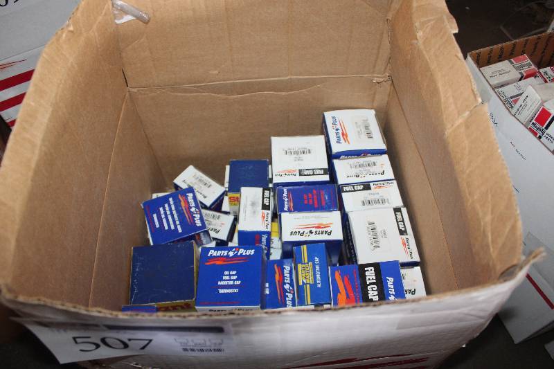 lot 507 image: Lot of (Approximately 20) Parts Plus Fuel Cap, Radiator Cap New In Box Includes P6818, P7020, P6825, P7039, P6825