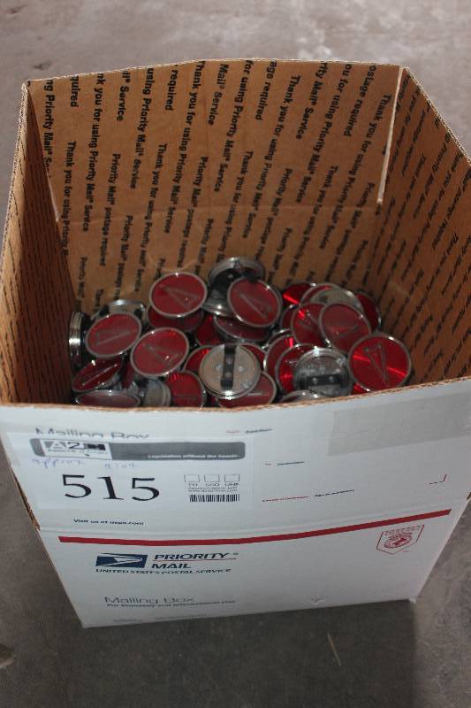 lot 515 image: Box Lot of Pontiac Arrowhead Badge New