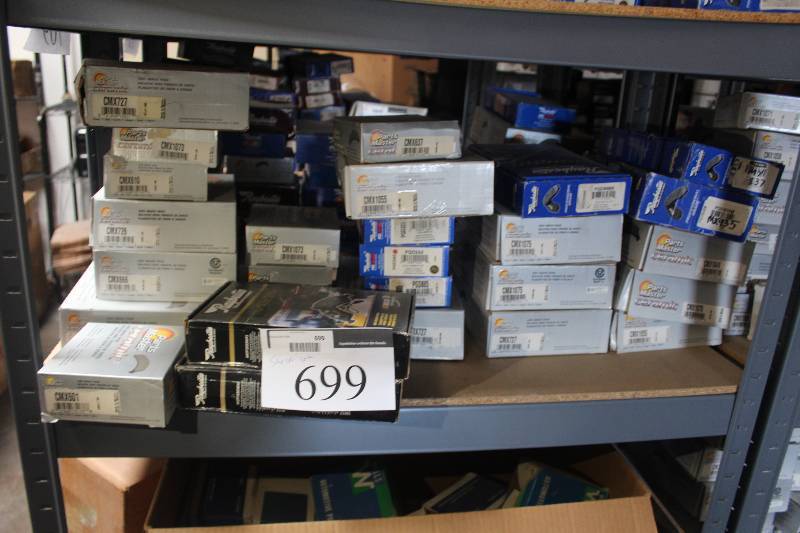 lot 699 image: Shelf Lot of Parts Master, Raybestos Disc Brake Pads New In Box Includes CMX727, CMX1073, CMX610, CMX726, CMX601, ATD154C, CMX1055, PGD242, CMX1075, CMX1070, CMX1049, CMX1055, MX935