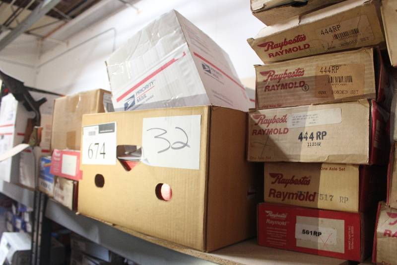 lot 674 image: Shelf Lot of Standard Automotive Parts, Borg Warner Distributor Cap, Raybestos Relined Brake Shoes, Safe Line Brake Parts, Motorcraft Distributor Cap New In Box Includes DHC-430, M88788R329, 479RP, 519RP, EGV351, EGV343, EGV355,