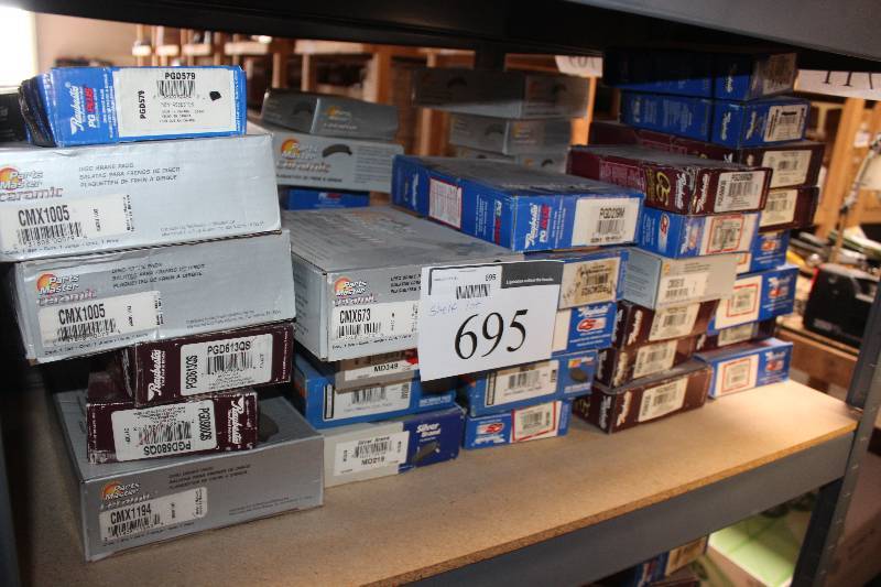 lot 695 image: Shelf Lot of Parts Master, Raybestos Disc Brake Pads New In Box Includes CMX1005, PGD579, PGD613QS, PGD580QS, CMX1194, PGD617QS, PGD652QS, PGD722QS, MD242, PGD219M, PGD409QS, CMX610, PGD617QS, PGD790QS