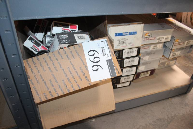 lot 696 image: Shelf Lot of Parts Master, Raybestos Disc Brake Pads, Borg Warner Electrical Parts New In Box Includes CMX1104, CMX642A, CMX1210, CMX632, PGD758QS, ATD679M, PGD557M, ATD679M