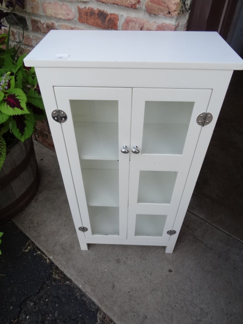 lot 11 image: 2 Door Wood Cabinet 19 X 10 X 36