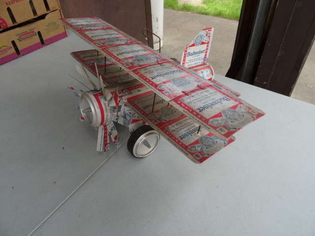 lot 126 image: Air Plane Made out of Budweiser  Cans