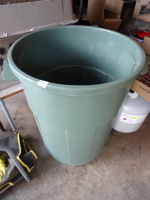 lot 192 image: 44 Gal. Garbage Can. Bag of Floor Dry,