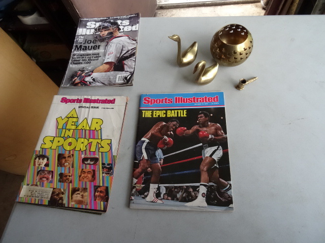 lot 226 image: Sports Illustrated  Mohammed Ali,