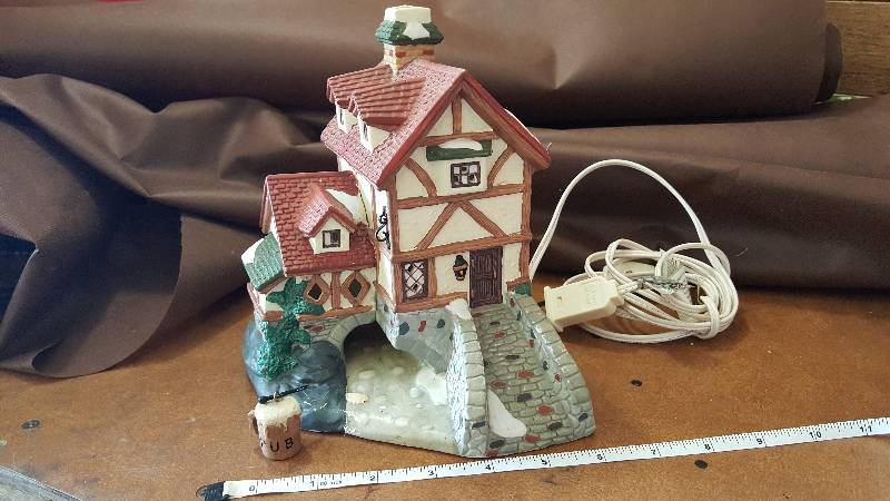 Little winter cottage with light