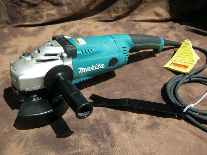 lot 64 image: Makita 7 Angle Grinder