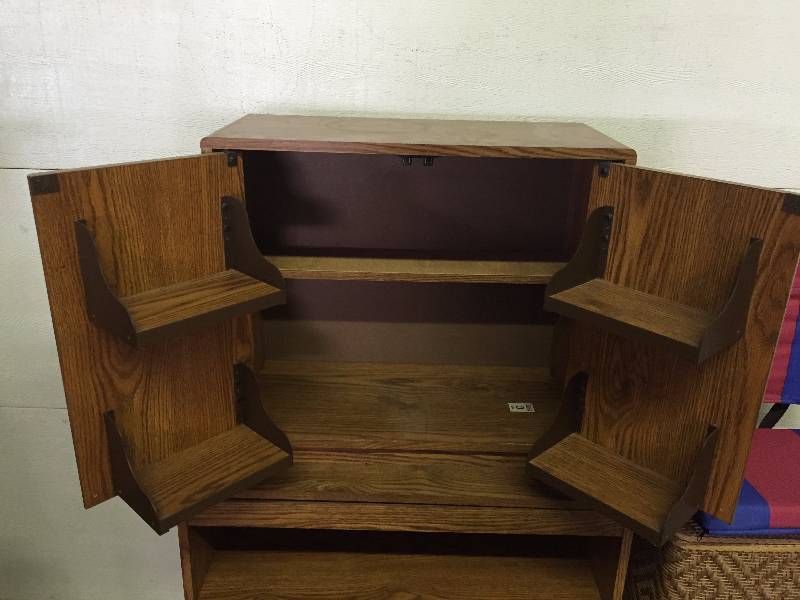 lot 21 image: WICKER HAMPER, TV STAND WITH STORAGE, MOVIE CASE, STADIUM SEAT