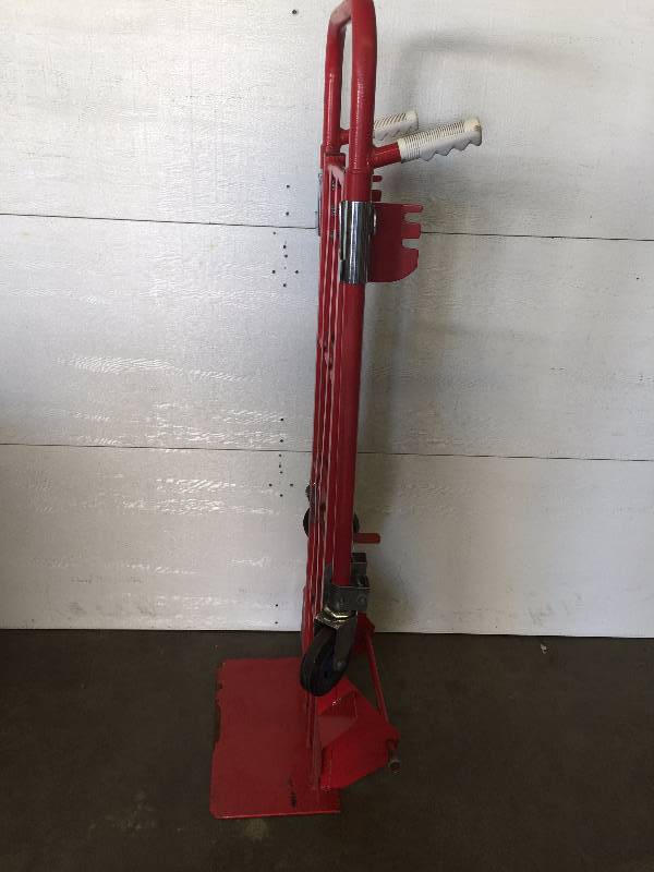 lot 35 image: SMALL HOMEMADE ANVIL, UNIVERSAL MOVING CART MISSING WHEELS