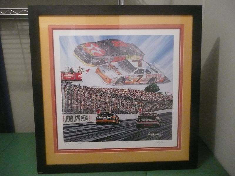 lot 2 image: NASCAR PROFESSIONALLY FRAMED- SIGNED BY ARTIST SAM BASS 29 12in wide 29 12in high
