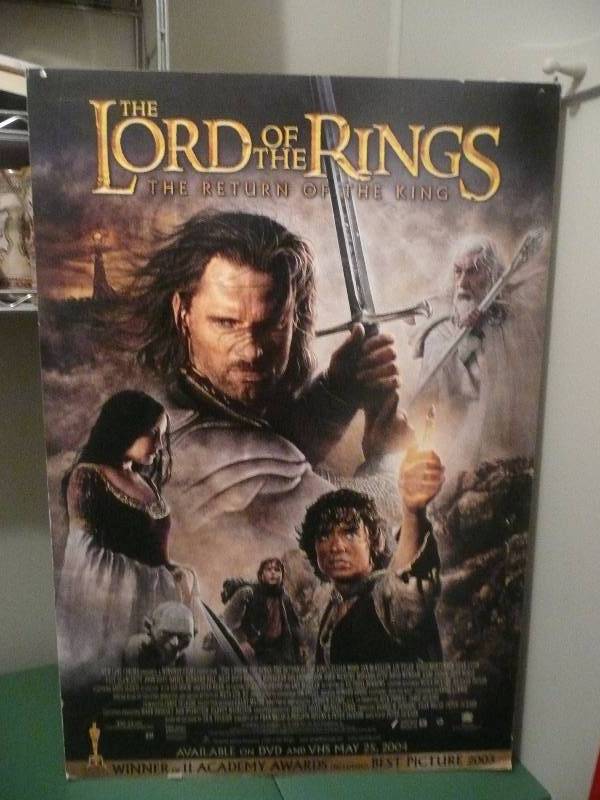 lot 33 image: Lord Of The Rings Movie Sign From Theatre Advertising (BIG Approx 27in wide 40in high) Solid Backed