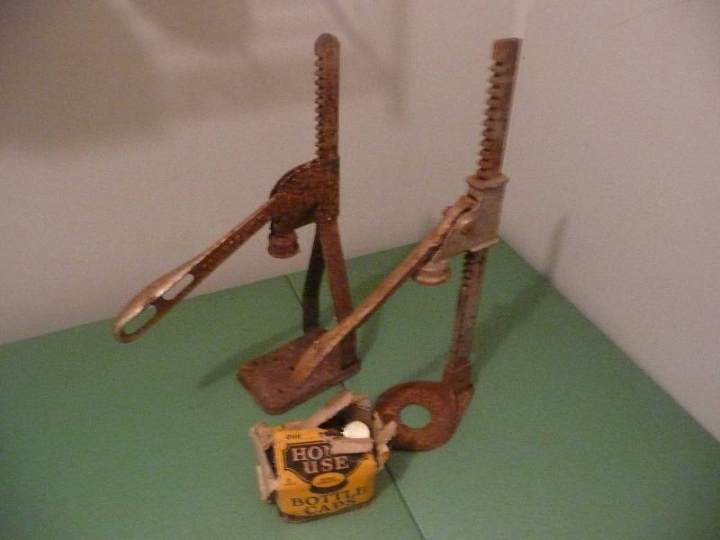 lot 34 image: ANTIQUE Vintage Metal Bottle Cappers with bottle caps and box