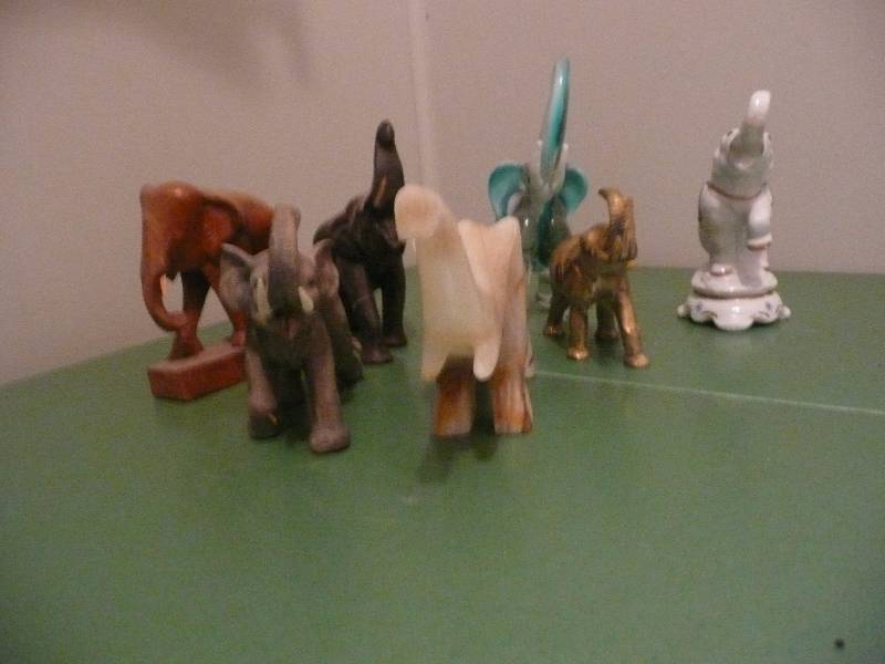 lot 49 image: Large Lot of Different Types Of Carved  Cast Elephants - All Vintage