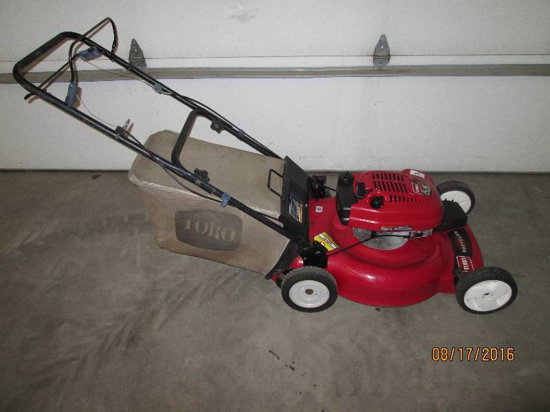 lot 2 image: Toro Self-Propelled 6.5HP Lawn Mowe...