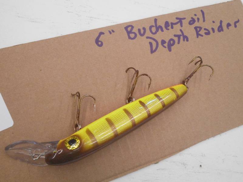 lot 192 image: (1) 6 BucherTail Depth Raider Musk...