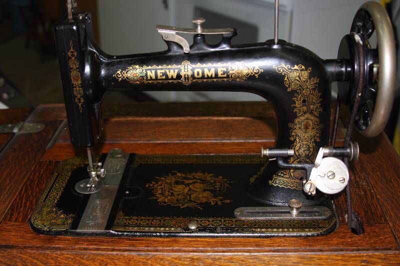 lot 1-3 image: Antique New Home Sewing Machine
