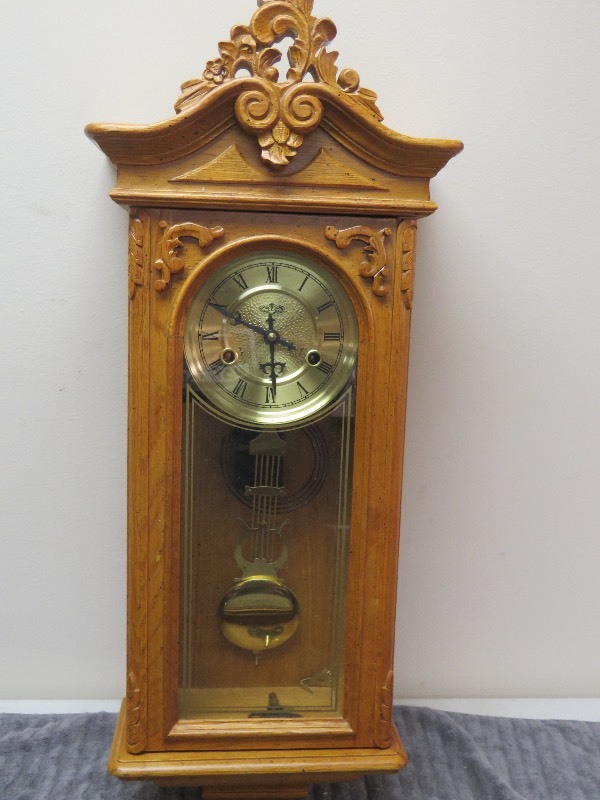 lot 60 image: Hanging Wall Clock