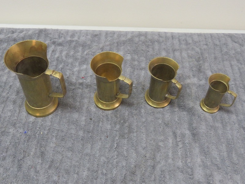 lot 70 image: Brass Measuring Cups