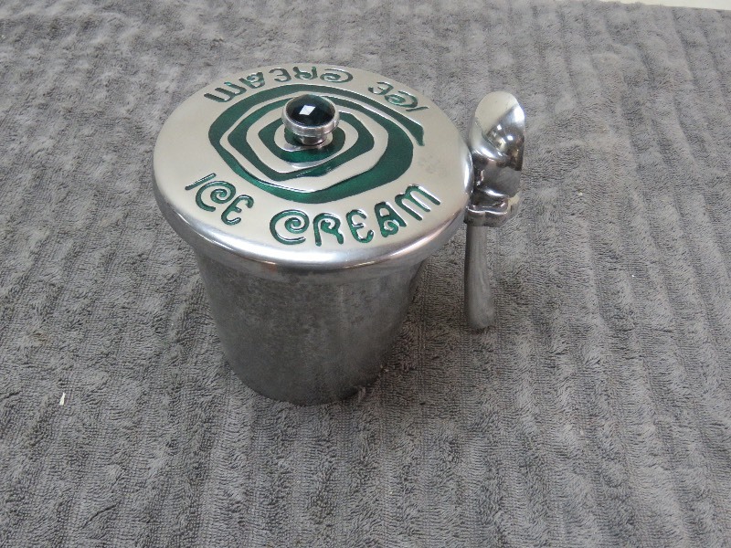 lot 78 image: Ice Cream Container and spoon