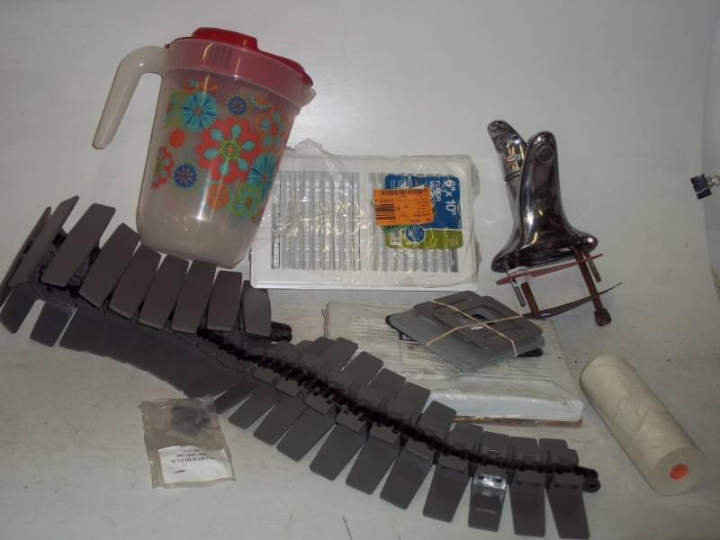 lot 19 image: Water Pitcher, Floor Registers, chain with plastic covers, and faucet