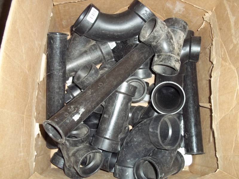 lot 26 image: New Box of Black PVC Plumbing Fittings