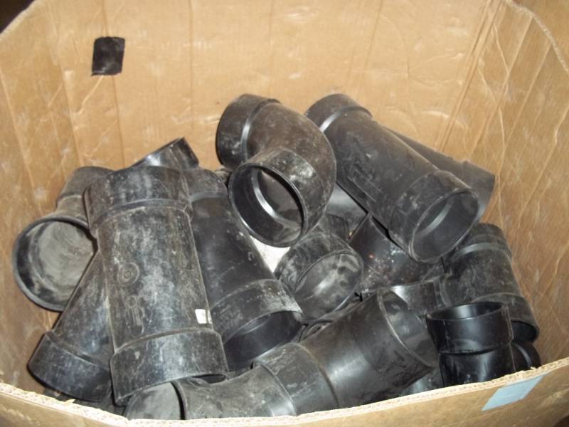 lot 28 image: New Box of Black PVC Plumbing Fittings
