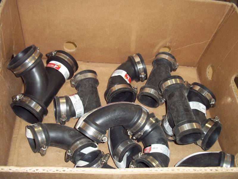 lot 29 image: New Rubber Couplings 1-12 - 2