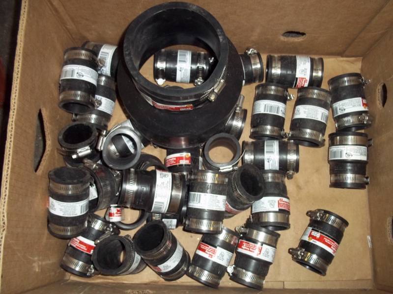 lot 31 image: New Rubber Couplings 1-12 - 2