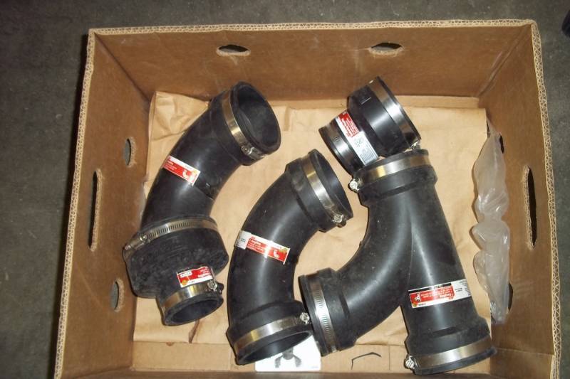 lot 50 image: New Box of Rubber Couplings
