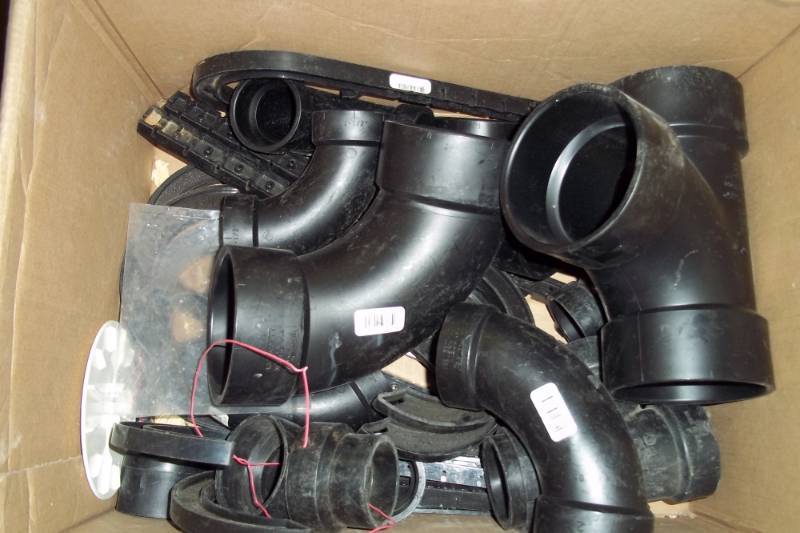 lot 51 image: New Box of Black PVC Plumbing Fittings