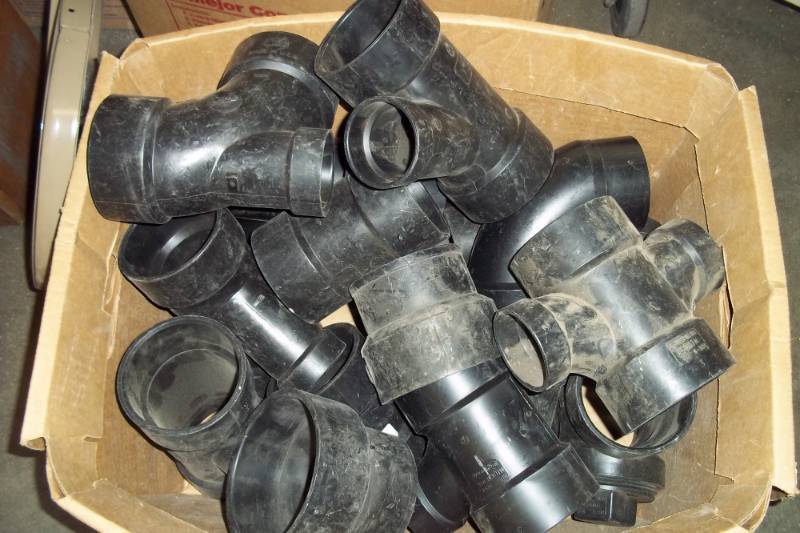 lot 52 image: New Box of Black PVC Plumbing Fittings