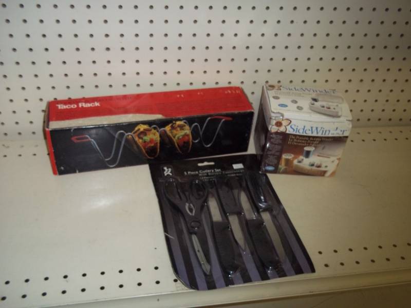 lot 198 image: Singer Bobbin Winder, Taco Stand, 5 pc Cutlery Set