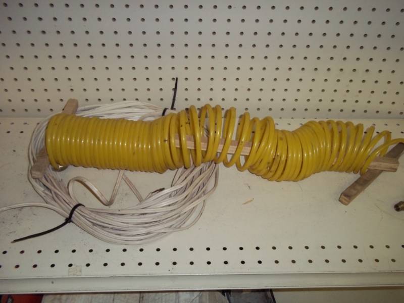 lot 220 image: Flexible Air Hose and electrical wire